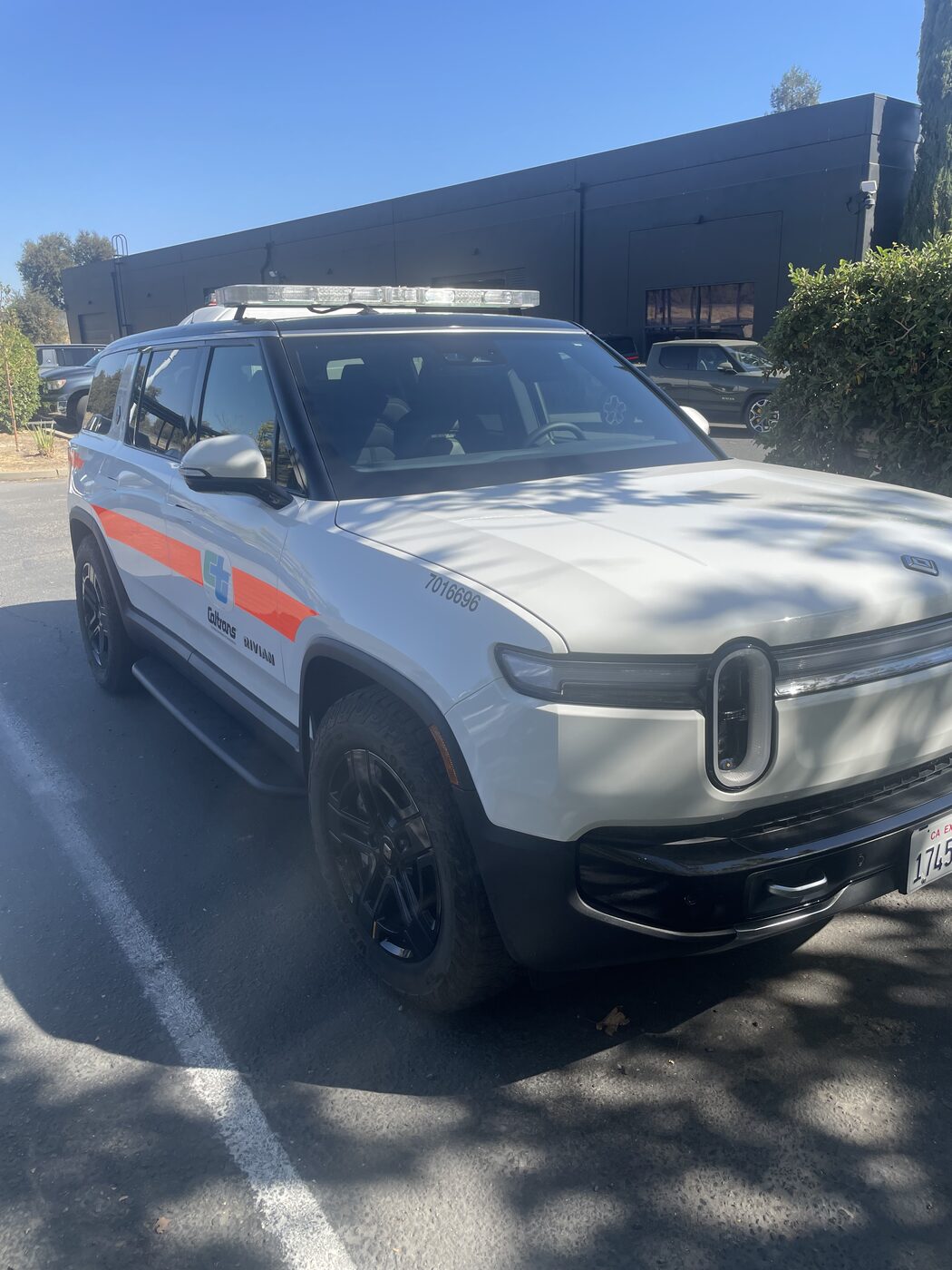 A Rivian fleet vehicle with new glass