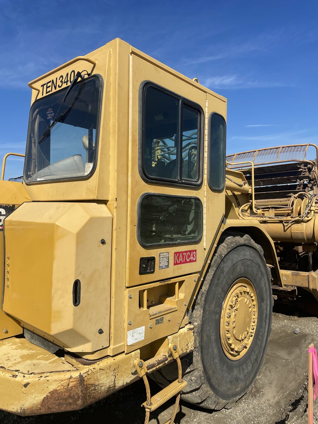 A Cat scraper cab with glass replaced